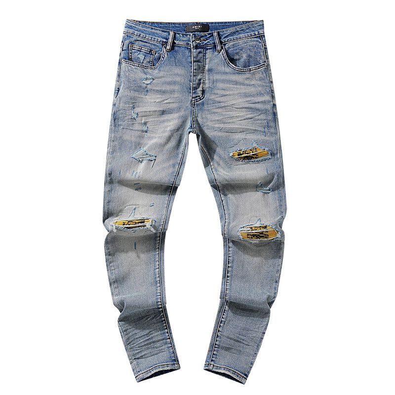 Amiri Jeans Ripped Patch Slim-Fit Stretch Slim-Fit Jeans